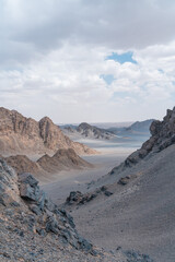 landscape that  clouds over the mountain in desert