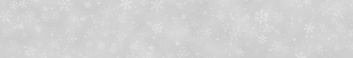 Naklejka na ściany i meble Christmas banner of snowflakes of different shapes, sizes and transparency on gray background