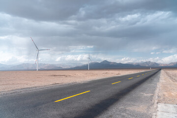 wind turbine on the road in desert