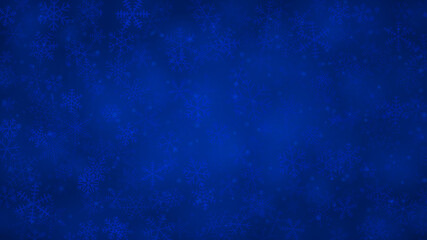 Christmas background of snowflakes of different shapes, sizes and transparency in blue colors