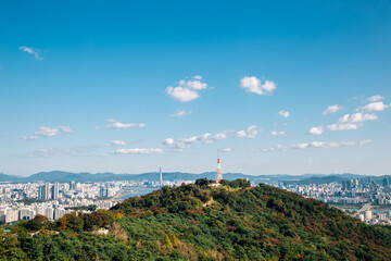 Fototapeta na wymiar Panoramic view of Seoul city and mountains from Namsan tower in Seoul, Korea