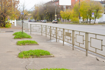 Metal fence near the city road