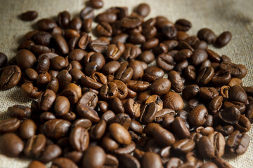 Sprinkled coffee beans on the table