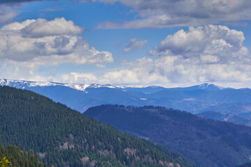landscape with clouds over the mountains