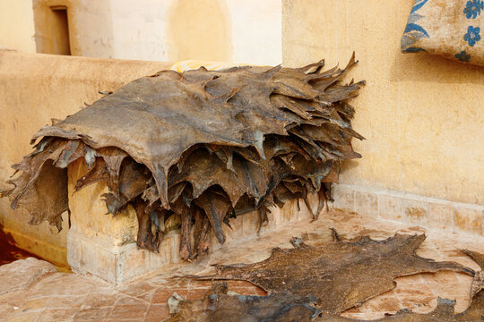 Stack of dried goat hides used for traditional leather production at the Chouara tannery, Fez, Morocco.
