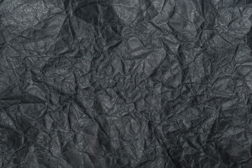 Black crumpled paper textured background for product overlay or backdrop design