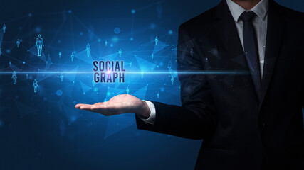 Elegant hand holding SOCIAL GRAPH inscription, social networking concept