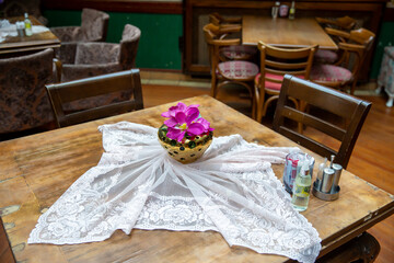 front view flower on wooden table