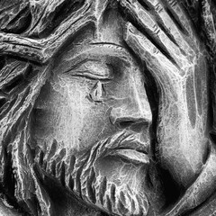 Fragment of antique statue the suffering of Jesus Christ. Close up.