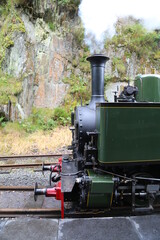 Naklejka premium The front of an old steam engine on the Talyllyn Railway, Gwynedd, Wales, UK.