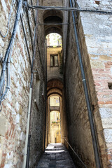 Authentic alley in small village in tuscany in Italy