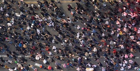 Aerial top view of flash mobs protesters demonstration rally on street road against government, crowd of people in Bangkok City, Thailand in public for democracy. Politics concept. Insurrection. - obrazy, fototapety, plakaty