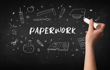 Hand drawing PAPERWORK inscription with white chalk on blackboard, education concept