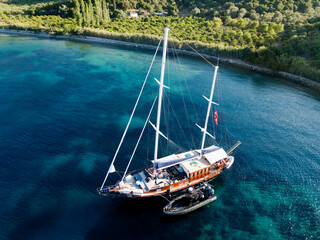 Aerial view of a sailing boat in Mersincik Cove, Datca Peninsula Turkey