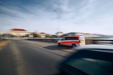Obraz na płótnie Canvas Ambulance car in blurred motion