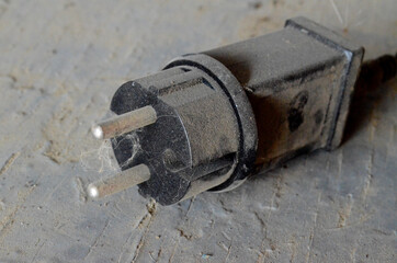 wide black plastic plug for socket