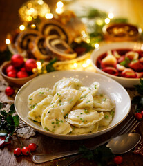 Christmas dumplings with vegetarian stuffing, a traditional Christmas Eve dish in Poland close up...
