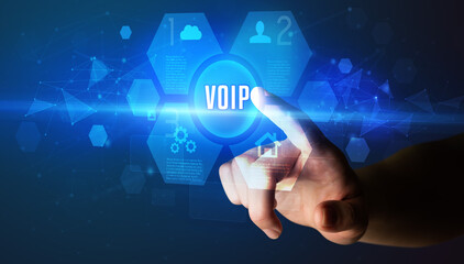 Fototapeta premium Hand touching VOIP inscription, new technology concept
