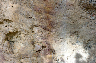 Natural mountain stone,a section of rock texture on a Sunny day.