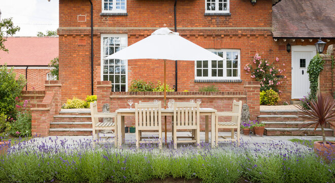 House and garden furniture on a patio in UK back garden