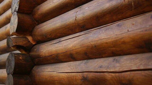 Wall of a wooden building made of logs