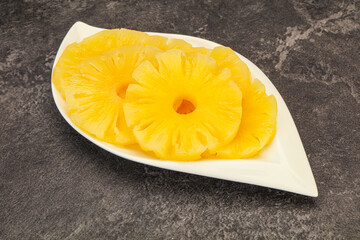 Marinated pineapple rings in the bowl