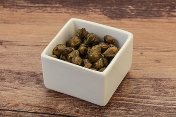 Tasty capers in the bowl