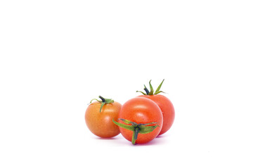 Italian bunch of tomatoes.
Three small and juicy tomatoes.