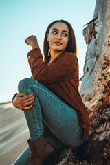 moroccan girl in the dunes of the south of spain and beach coast white tarifa bolonia