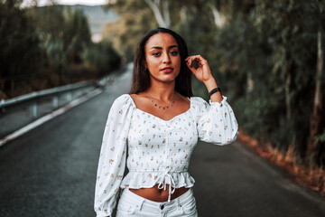 moroccan girl in the dunes of the south of spain and beach coast white tarifa bolonia