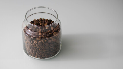 Fototapeta na wymiar Coffee beans in a glass