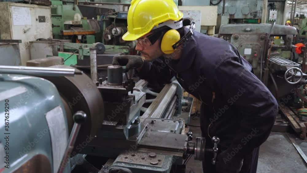 Poster smart factory worker using machine in factory workshop . industry and engineering concept.