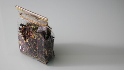 Herbal tea on a bag with tea leaves, herbal tea on white background 