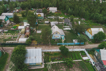 Fototapeta na wymiar Aerial Townscape of Suburban Village Sosnoviy Bor located in Russia near the town Kandalaksha