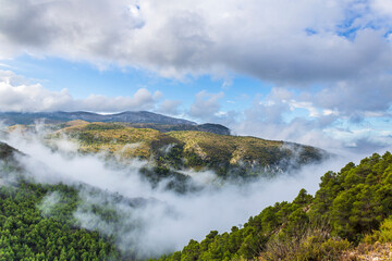 Confrides mountain´s port in the morning one day with low fog and clouds.