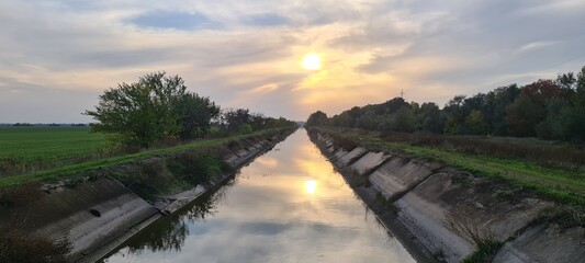 Fototapeta premium sunset over the river