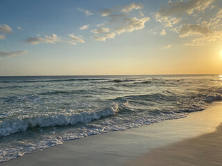 sunset over the Gulf of Mexico water Florida Emerald Coast
