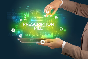 Obraz premium Close-up of a touchscreen with PRESCRIPTION PILL inscription, medical concept