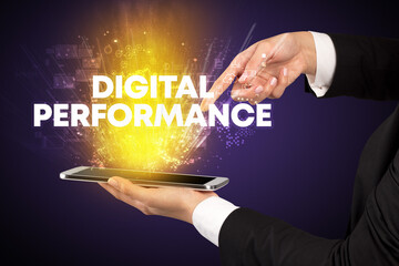 Close-up of a touchscreen with DIGITAL PERFORMANCE inscription, innovative technology concept