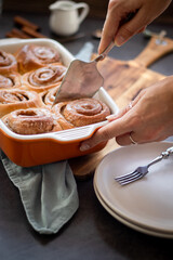 Fresh baked homemade cinnamon rolls with icing, real autumn vibes