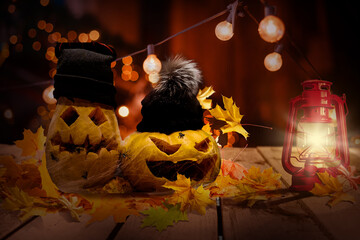 Halloween pumpkins on rocks at night
