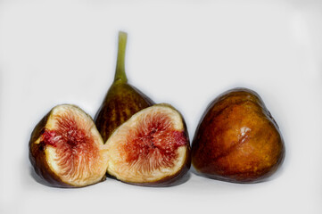 Fresh figs are highlighted on white. Figs fruit. Natural background.