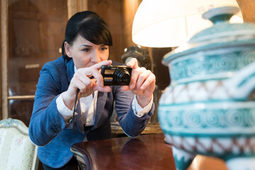 woman talking a picture in a museum