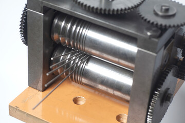 Jewelry rolling mill tool press rolling of a silver wire