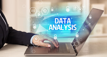 DATA ANALYSIS inscription on laptop, internet security and data protection concept, blockchain and cybersecurity