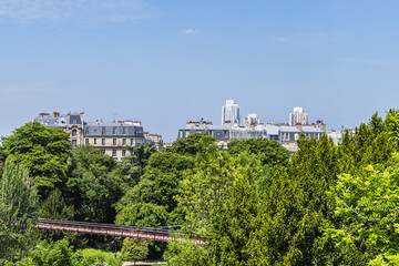 Fototapeta premium Buttes-Chaumont Park (Parc des Buttes-Chaumont, 1867) - Public Park situated in northeastern Paris. Buttes-Chaumont Park - fifth-largest park in Paris. France.