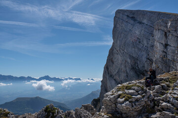 Mountain landscape in summer with clouds stuck in the summits