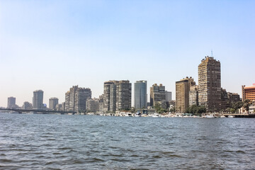 Obraz premium Egypt, Cairo - 05/05/2015: Walk around the city in the afternoon. Buildings and the Nile River.