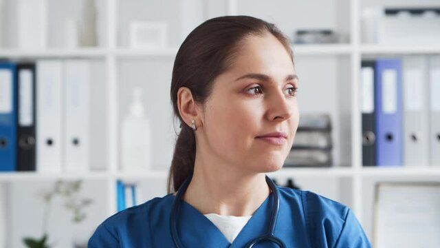 Professional medical doctor in hospital office, Portrait of young and attractive female physician.
