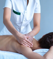 Fototapeta premium Close-up of traditional healing and recreation massaging treatments. Health, skin care, massage, osteopathy and manual therapy.
